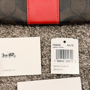 Coach Signature Brown and Red Wristlet